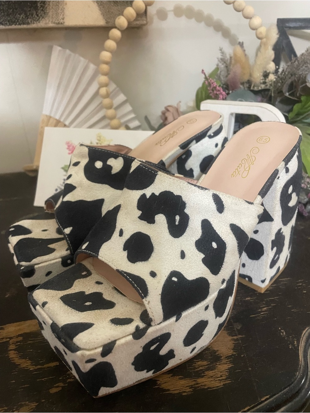 Platform Slide Heels in Black and White Cow Print by